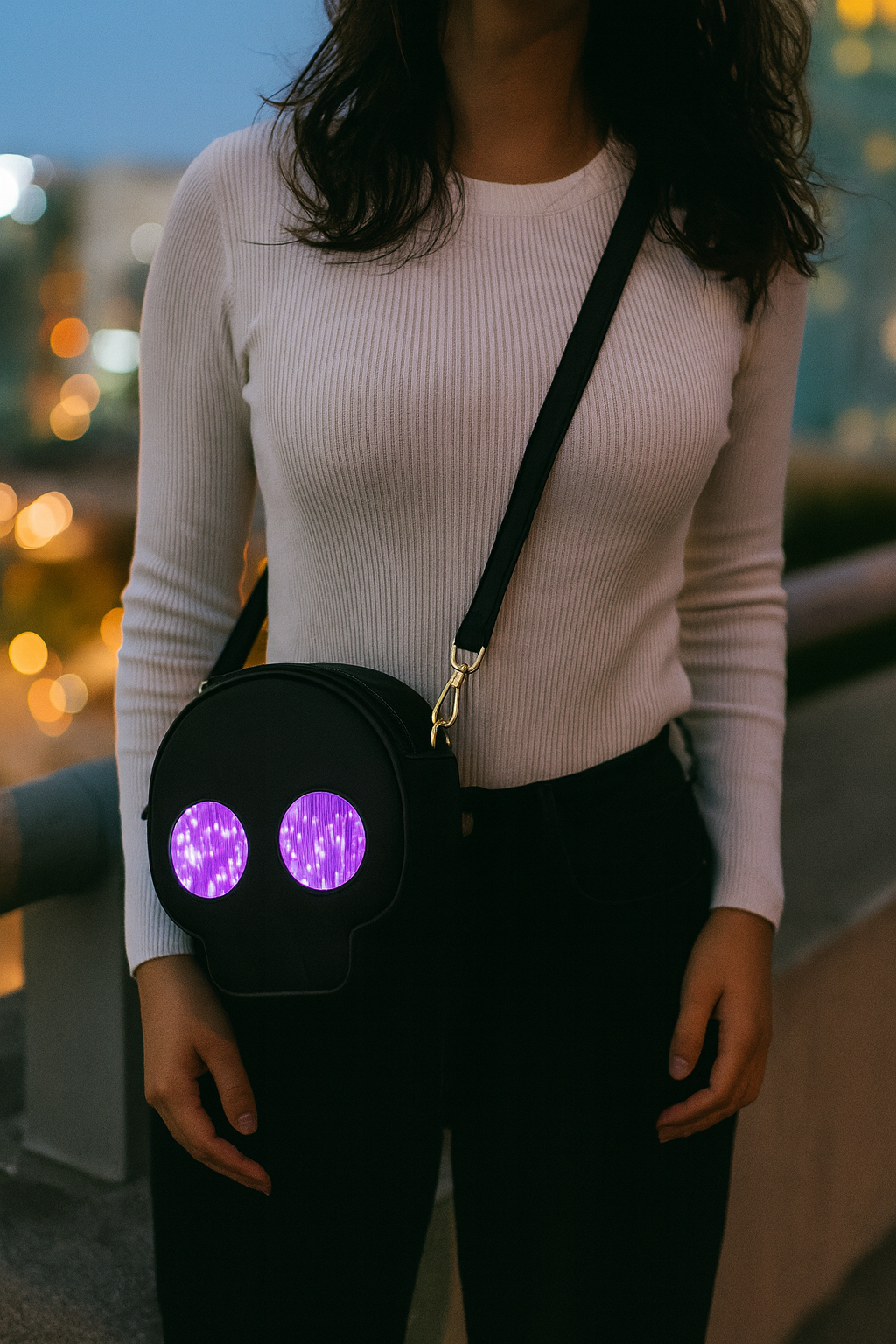 Model wearing the Haske Nocturne Bag as a crossbody at night